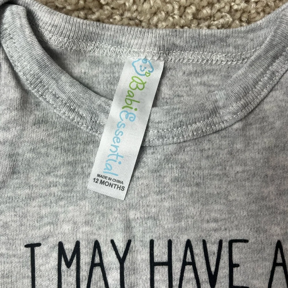 Baby Onesie “I May Have a Small Finger But I Have My Aunt Wrapped Around It”